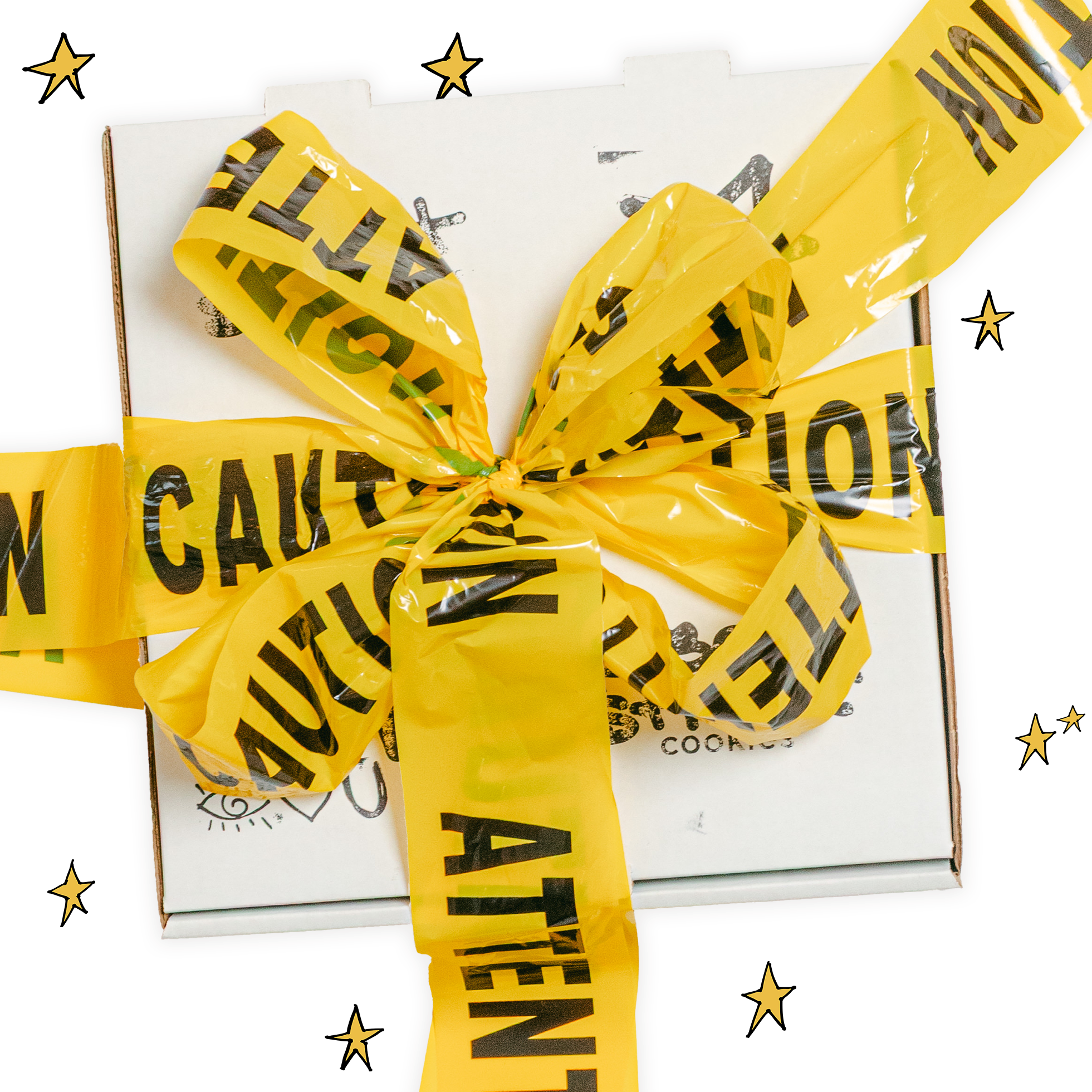 Gift box wrapped with yellow caution ribbon on a white background