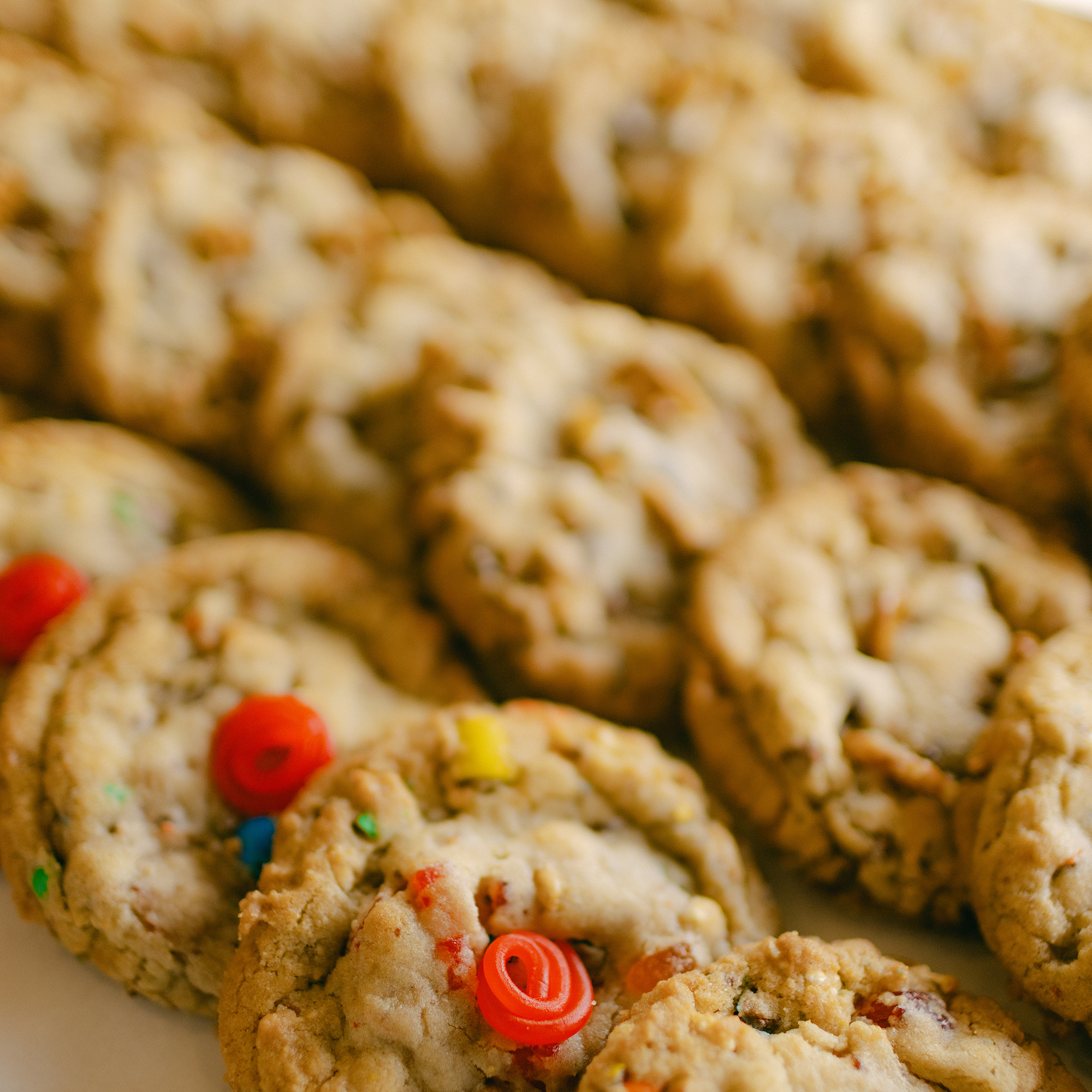 Close-up of cookies with colorful candies on a plate